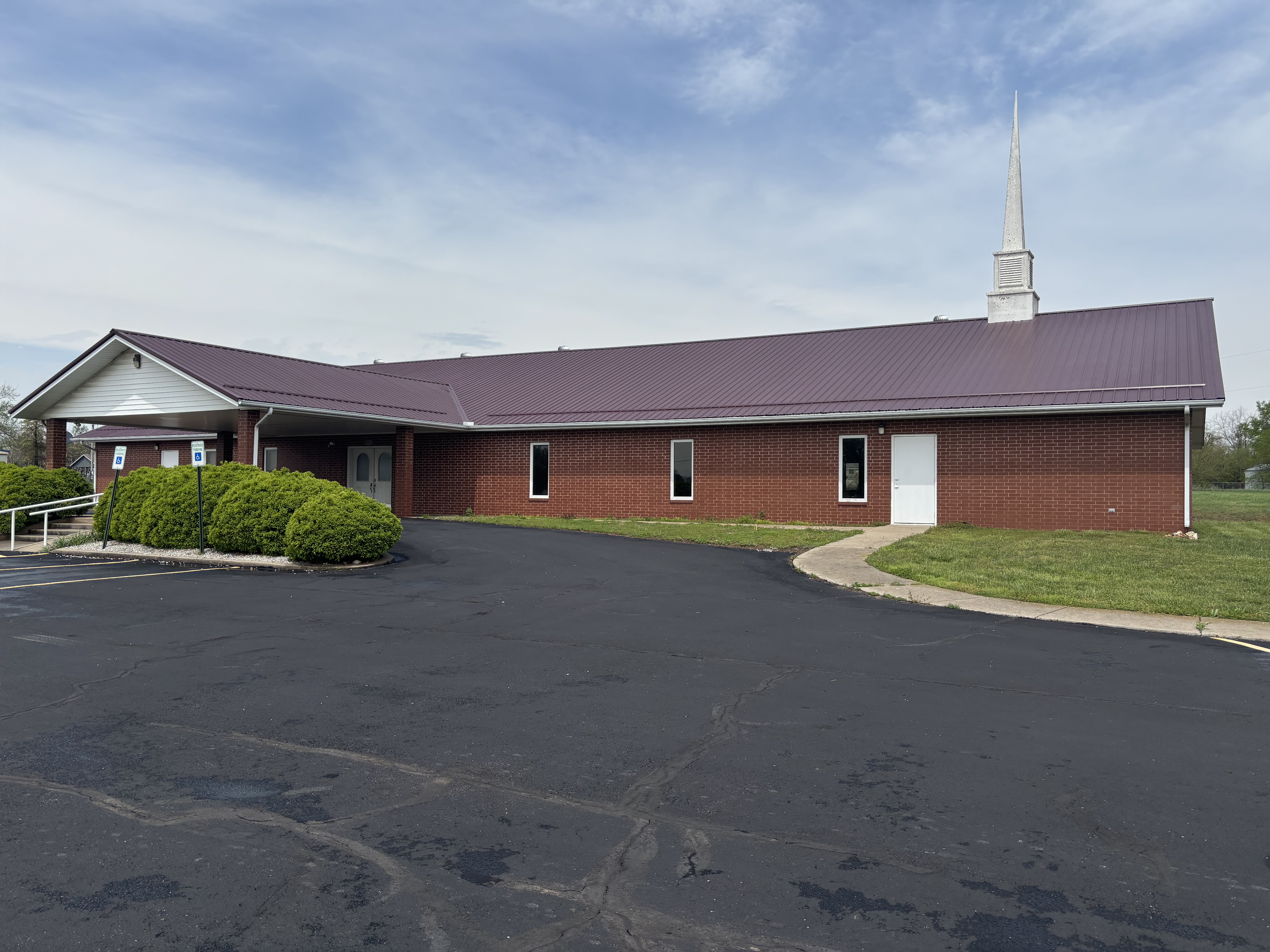 The New Freedom Worship Center on a sunny day, picture showing the church from the front